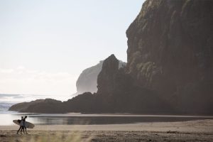 Surfing in Piha: Auckland’s Wild Black-Sand Beach